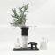 small simple abstract art minimalist room table animal sculpture
