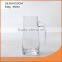 glass wine decanter with colored glass handle and scale