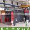 Newest Hook Continuous Through Shot Blasting Machine/Sand Blast Machine