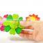 Promotional beautiful flower design wooden spinning top