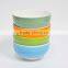 Baby feeding small ceramic rice bowl with colorful painting