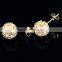 18k gold ball stud earrings display