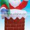 Inflatable Santa in chimney