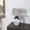 Modern art style grey and white base bedroom ceramic desk lamp for hotel