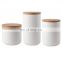 New custom certificated white black cylinder unique empty ceramic coffee tea storage bottles jar with wood lid