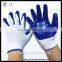 Wholesale thirteen needle woven nylon core yarn nitrile coated work safety gloves