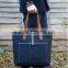 Custom large denim tote bag with leather trim