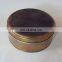 Vintage flat round tin box with embossed logo to metal storage box