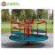 Four person children play items rotating toy merry go round