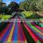 New attractive outdoor unpowered cheap price rainbow slide game on sale