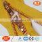 shenzhen xly wholesale yellow polyester tape copper teeth metal zipper