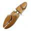Painted type wooden shoe tree in lotus wood and thin wax on the surface with double tube