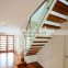 Pressed glass balustrade spotted gum treads elegant modern stairs