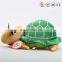Plush green shell turtle with glasses