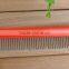 Plastic dog comb with adjustable needles
