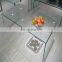 curved/bent modern type glass coffee table