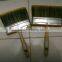 green plastic handle paint brush