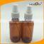 2oz Amber Boston Round plastic Bottle with Fine Mist Sprayer Dispenser