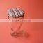 irregular shaped boots shaped glass stash jar with screw lid