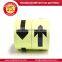 Pressure-sensitive adhesive arrow photoluminescent tape