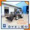 Farm tractor with front loader and backhoe loader