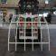 Forklift Attachment With Hinged Broke Handler and Material Handling Clamp