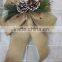 jute christmas bowknots with pines and pinecones