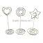heart shaped wire holder memo clips with spiral wire base for party favors at a wedding reception