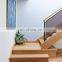 Custom perforated steel screen balustrade staircase with black steel feature