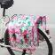 beautiful rose blossom pannier bike