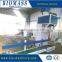 Packing machine for wood briquette