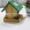Finished colorful handmade wooden bird nest