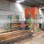 vertical cutting wood band sawmill with log conveyor