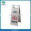 foldable caution wet floor stand in school dining room