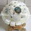 Elegant bridal bouquet with brooch