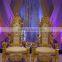 silver frame white fabric bride and groom wedding chairs