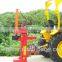 Farm using log cutter and splitter