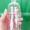 235 ml clear woozy round wine bottle with screw lids