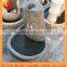 dancing stone water fountain with fish