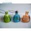 Colored glass bee catcher with handle