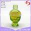 green skull shape glass bottle for perfume