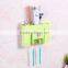 Toothbrush holder and toothpaste dispenser