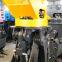Excavator grabs wooden objects Garden catching wood Grass catching machine Grab a stone