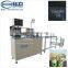 Automatic cosmetic products packaging machine
