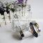 Decorated candle in clear glass jar