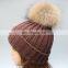 Wholesale latest UK style acrylic crochet hat with raccoon fur poms knit hat