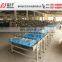 Automatic Up Paper Servo System Pillow Bread Dosa Maamoul Mooncake Packing Machine