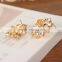 New Brand Design Hollow Out Flower Bow Stud Earrings With Shiny Crystal Simple Metal Ear for Women Earrings Jewelry