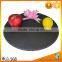 Black round natural slate placemat