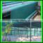 Dark green stair safety net for construction